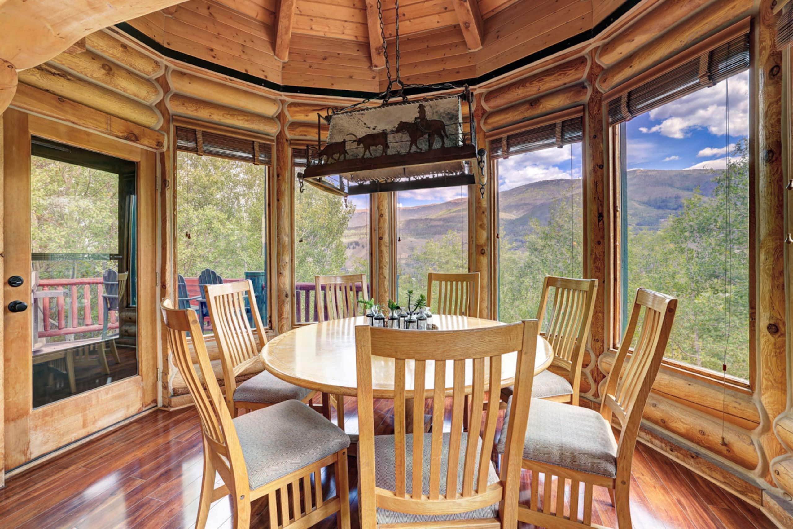 Dining nook surrounded by mountain views at Lincoln Lodge