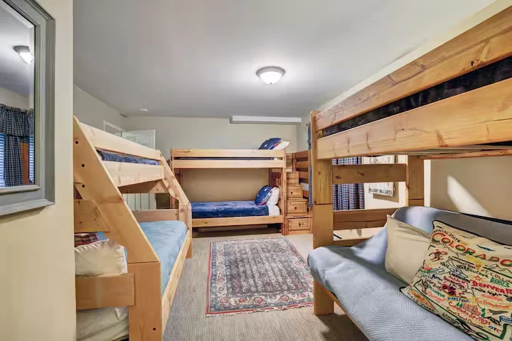 Bunk room at Lincoln Lodge with three handcrafted bunk beds
