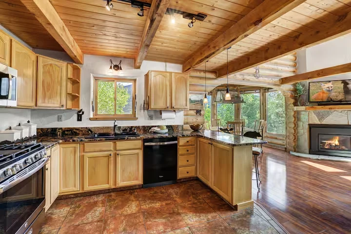 Gourmet kitchen opening toward the Lincoln Lodge living areas